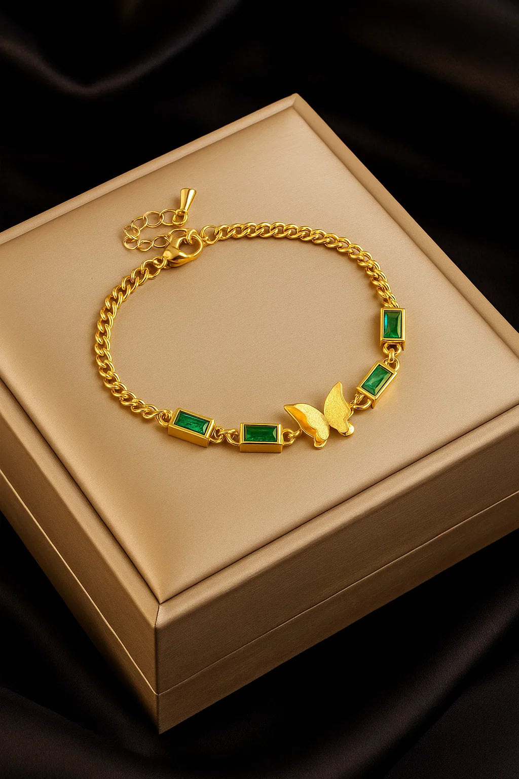 Golden Butterfly Charm Bracelet with Emerald Green Stones